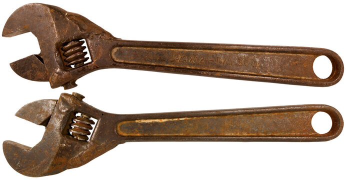 Closeup of an old rusty adjustable wrench isolated on white or transparent background, png. 19th century, Italy.