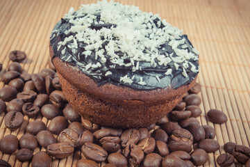 Fresh muffins with chocolate, coffee and desiccated coconut. Delicious dessert
