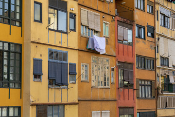 Fototapeta na wymiar View of the typical and colorful Onyar houses at Girona in Catalonia. These facades are situated over Onyar river.