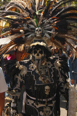 Fototapeta na wymiar Mexican aztec warrior skull costume