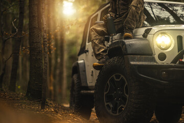 Hunter Taking Short Coffee Break During Off Road Drive © Tomasz Zajda