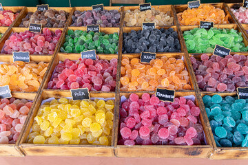 Colorful assortment of homemade candies with fruit flavors.
Translated text: blackberry, mango,...