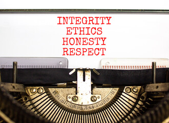 Integrity ethics honesty respect symbol. Concept word Integrity Ethics Honesty Respect typed on retro typewriter. Beautiful white paper background. Business integrity ethics honesty respect concept.