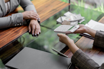 Business people signing contract making deal with real estate agent Concept for consultant home insurance.Real estate investment Property insurance security.