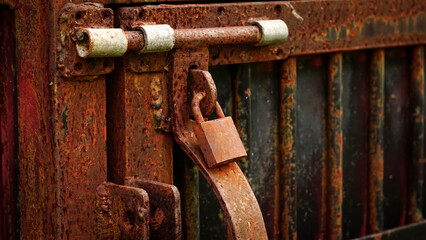 Rust corrosion cage.Old iron door slammer with grunge rusted key lock metal texture. Rusty...