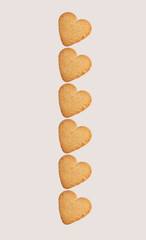 Cookies in the shape of hearts on a white background, collage