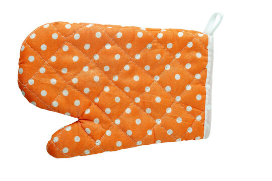 Top view orange textile with white dot cooking gloves for heat protection Isolated on transparent background.