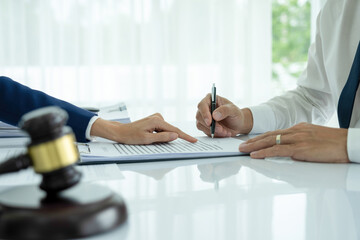 Attoney or lawyer viewing documents.