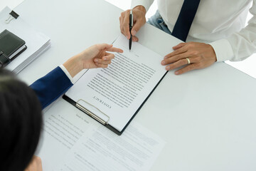 Attoney or lawyer viewing documents.