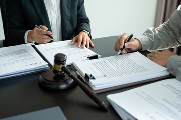 Attoney or lawyer viewing documents.