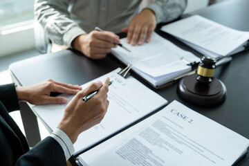 Attoney or lawyer viewing documents.