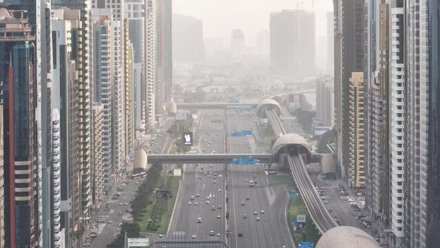 Aerial dolly shot showing Sheikh Zayed Road, Dubai, United Arab Emirates 
