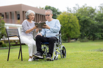 Senior couple taking care of each other in the park