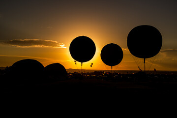 Gas Balloons Preparing for Launch at Sunset