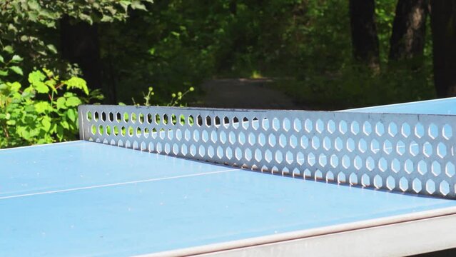 Close-up of a public table tennis or ping pong table in the park.