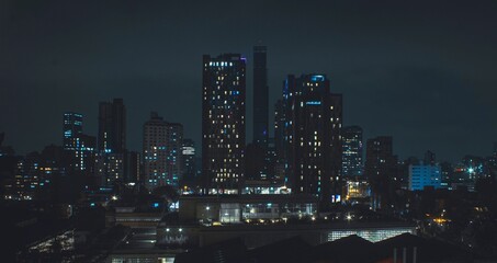 Panoramic of the city of Bogota at night - obrazy, fototapety, plakaty