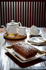 Afternoon tea with home baked tea loaf and white china