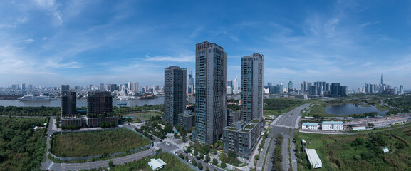 Vietnam, Ho Chi Minh City Skyline panorama on sunny clear day featuring architecture, Saigon River...