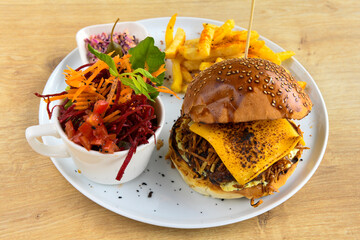 Big tasty burger, hamburger  with beef cutlet on a plate. Crispy chicken burger.