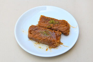 Turkish Dessert Sobiyet  Baklava, kadayif,  mussels baklava and classic baklava with Pistachio . Cevizli, Fistikli Baklava, top view.