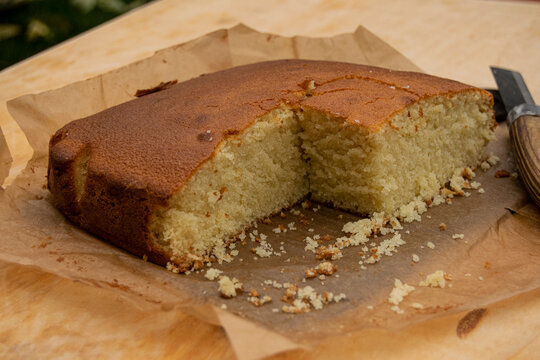 Handmade mannik pie is on the table. Delicious sweet traditional dessert. Close-up, wooden background.