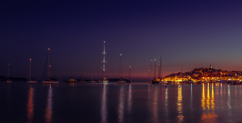 Fototapeta na wymiar sailing boat near Primosten at night 