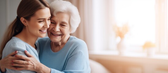 Nurse hugging elderly patients during visit at home - obrazy, fototapety, plakaty