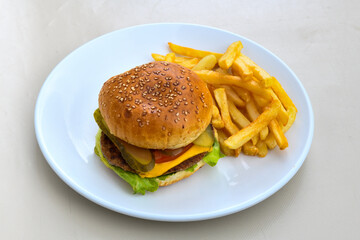 Big tasty burger, hamburger  with beef cutlet on a plate. Crispy chicken burger.