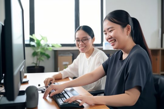 Happy Asian women co-workers in office workplace including person with blindness disability using computer with refreshable braille assistive device. Disability inclusion at work, Generative AI