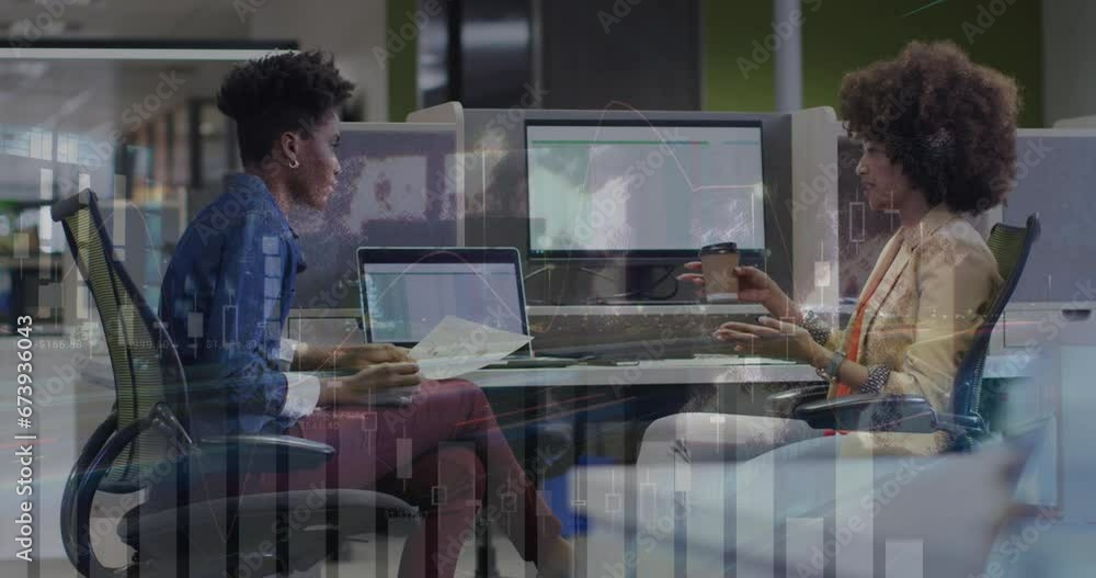 Poster animation of multiple graphs over diverse female coworkers discussing reports on computer