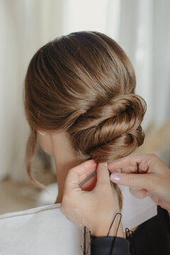 bridal bun hairstyle of brunette bride at the getting ready	