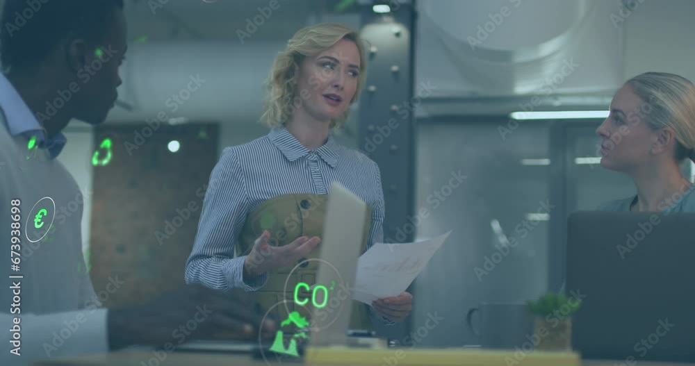 Poster animation of multiple icons over diverse coworkers discussing reports in office