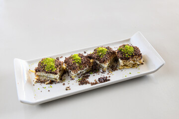 Turkish Dessert Sobiyet  Baklava, mussels baklava and classic baklava with Pistachio . Cevizli, Fistikli Baklava, top view.