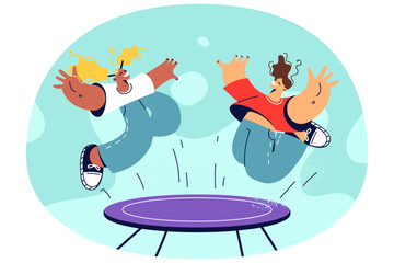 Obraz na płótnie Canvas Happy kids jumping on trampoline