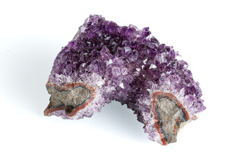 Amethyst mineral stone macro on white background