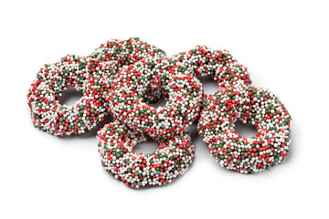 Heap of traditional Dutch Chocolate Christmas rings stuffed with fondant and covered with colorful...