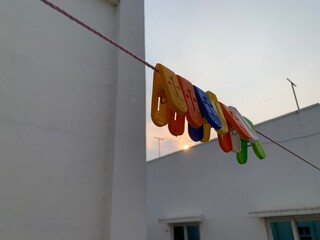 clothes peg on a clothesline with cloth clips