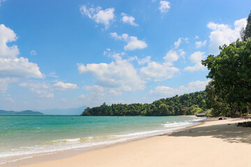 An ideal sandy tropical beach and clear turquoise sea, time for rest and relaxation.