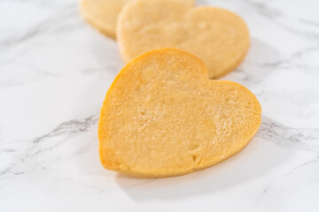 Heart-shaped sugar cookies with royal icing