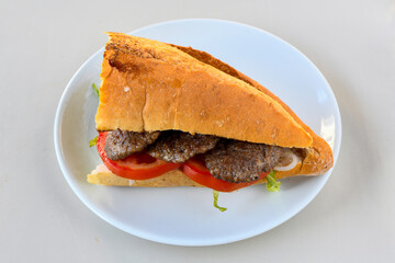Meatball between bread (Turkish name : ekmek arasi kofte ). Izgara kofte