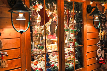 Window with christmas decorationand ornaments at night
