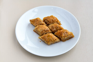 Turkish Dessert Sobiyet  Baklava, mussels baklava and classic baklava with Pistachio . Cevizli, Fistikli Baklava, top view.