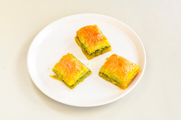 Turkish Dessert Sobiyet  Baklava, mussels baklava and classic baklava with Pistachio . Cevizli, Fistikli Baklava, top view.