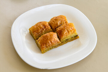 Turkish Dessert Sobiyet  Baklava, mussels baklava and classic baklava with Pistachio . Cevizli, Fistikli Baklava, top view.