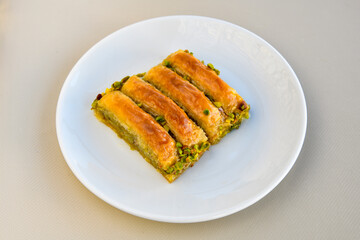 Turkish Dessert Sobiyet  Baklava, mussels baklava and classic baklava with Pistachio . Cevizli, Fistikli Baklava, top view.