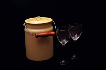Enamel can with two wine glasses absurd