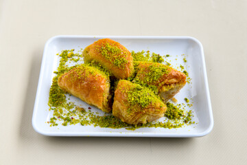 Turkish Dessert Sobiyet  Baklava, mussels baklava and classic baklava with Pistachio . Cevizli, Fistikli Baklava, top view.