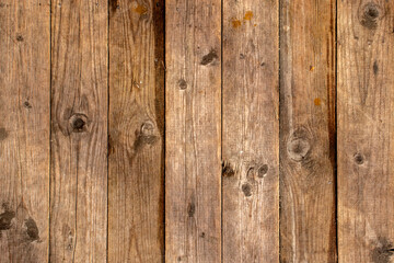 Vertical fibers of an old board close-up. Knots and fibers on an old board. The board dries out and...
