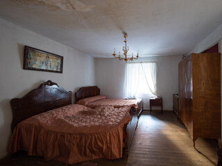 Room in an old house in a town in Castilla y Leon with antique furniture.
