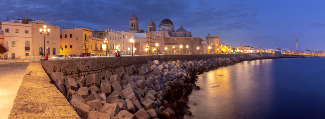 The building of the Cathedral of the Holy Cross in Cadiz at sunset. Spain. Andalusia.